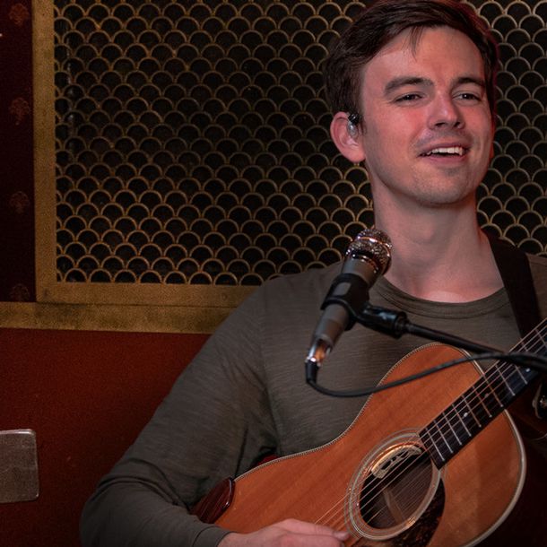 Josh Turner with Guitar and Microphone