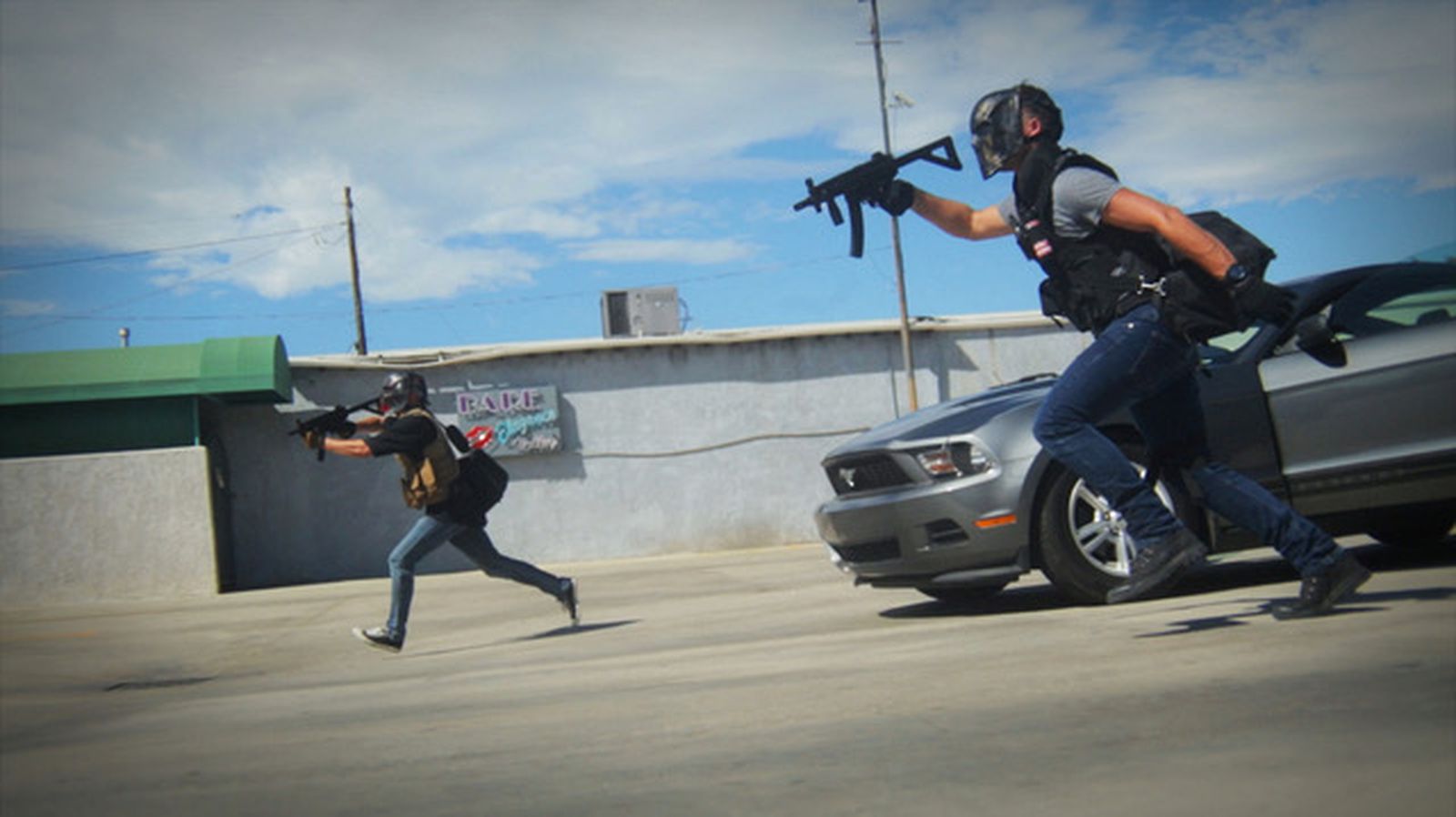 Men running with guns