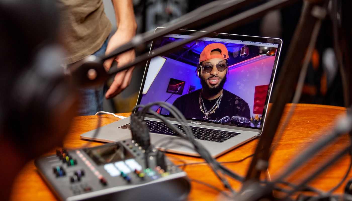 Justin Lyons calling into the Podcast from a laptop