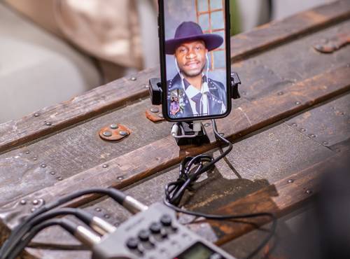 P4 with call-in guest on a mobile phone
