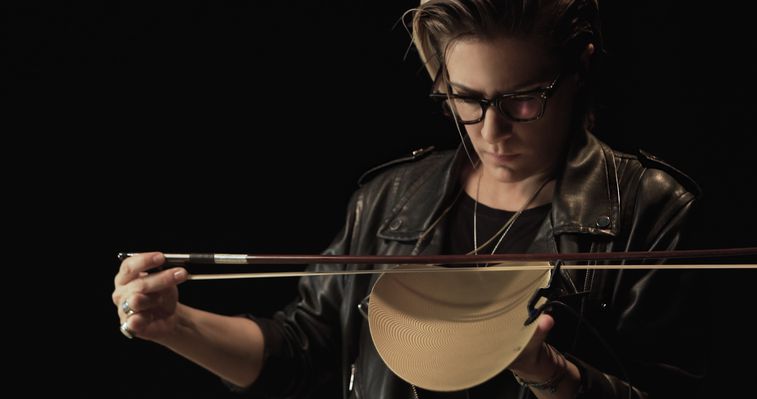 Chiara Luzzana recording audio from a brass bowl