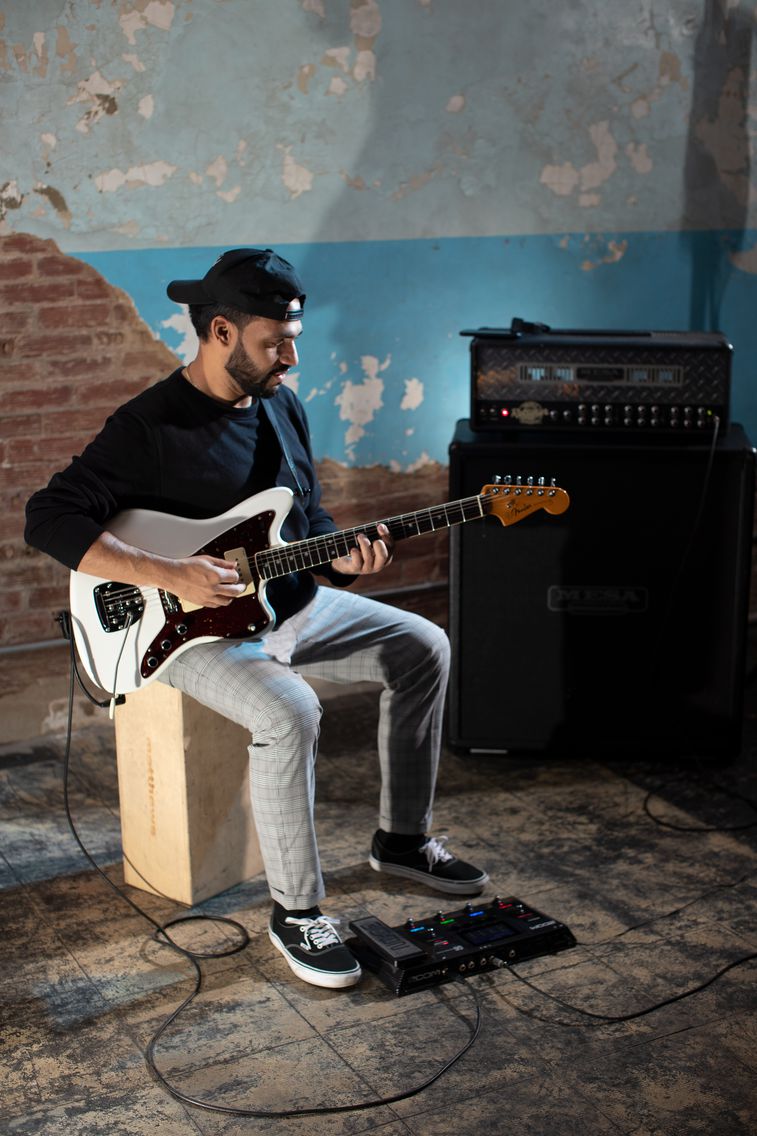 Ricardo Ramos playing his guitar