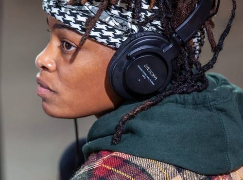 Podcaster wearing headphones