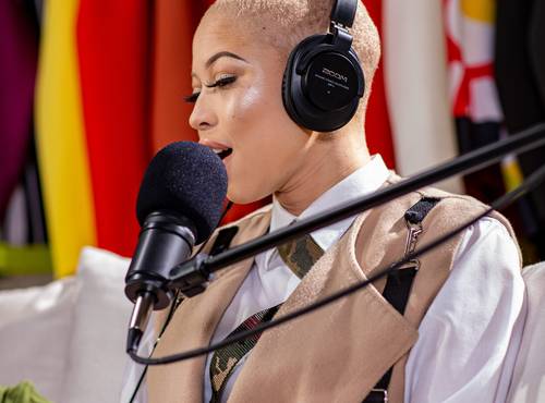 podcaster speaking into a professional mic
