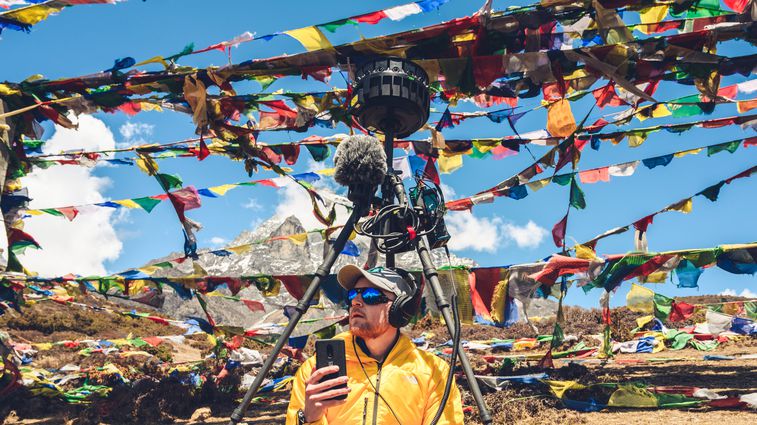Martin Edström monitors sound from his H3-VR during 360º video production at Mount Everest.