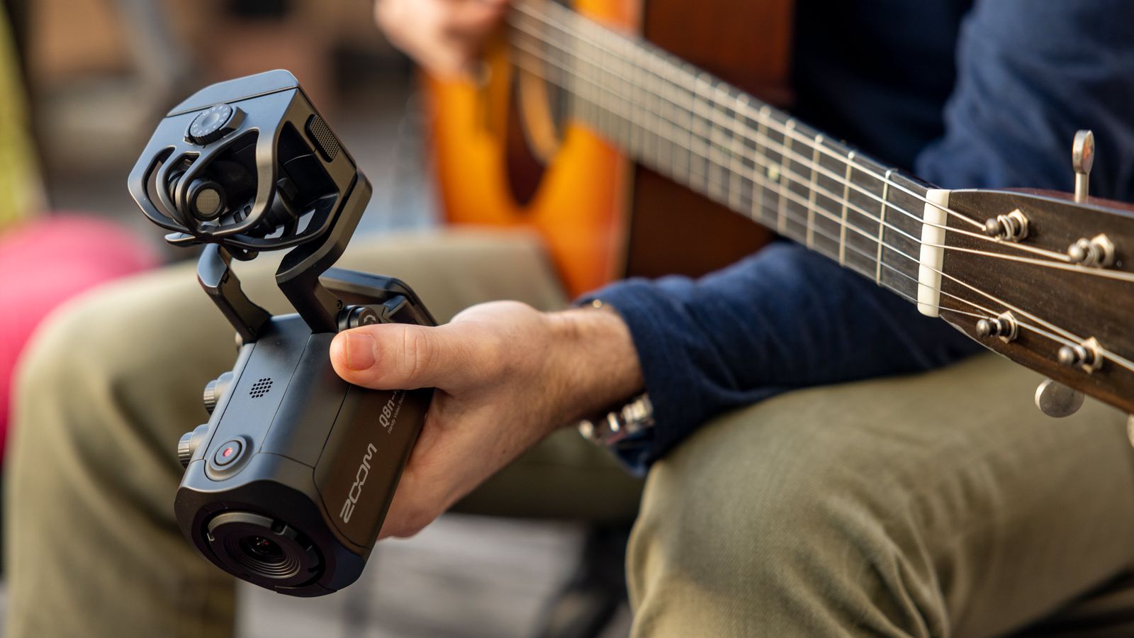 Musician holding the Q8n-4K
