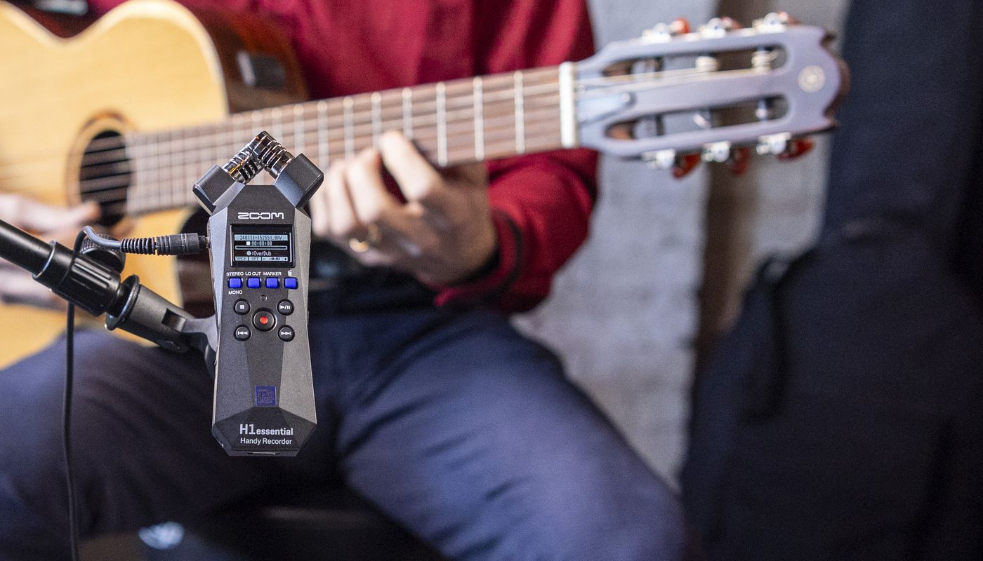 Guitar player using the H1e overdub feature to record multiple layers