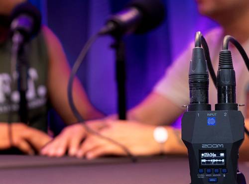 H1 XLR being used by two podcast hosts with two microphone inputs