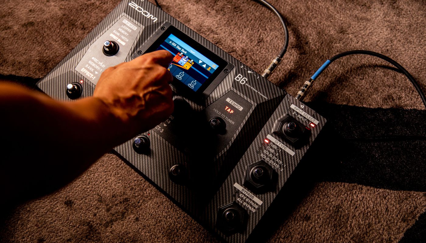 bassist dialing in a new modulation effect