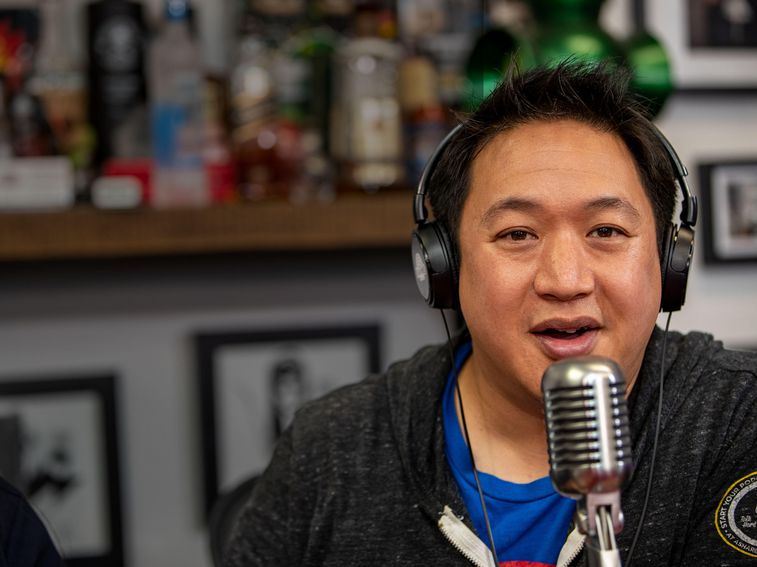 Ming talking into a mic